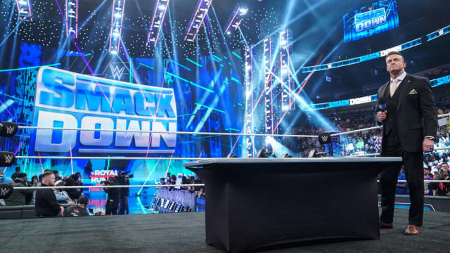 WWE SmackDown General Manager Nick Aldis in the ring for a contract signing.